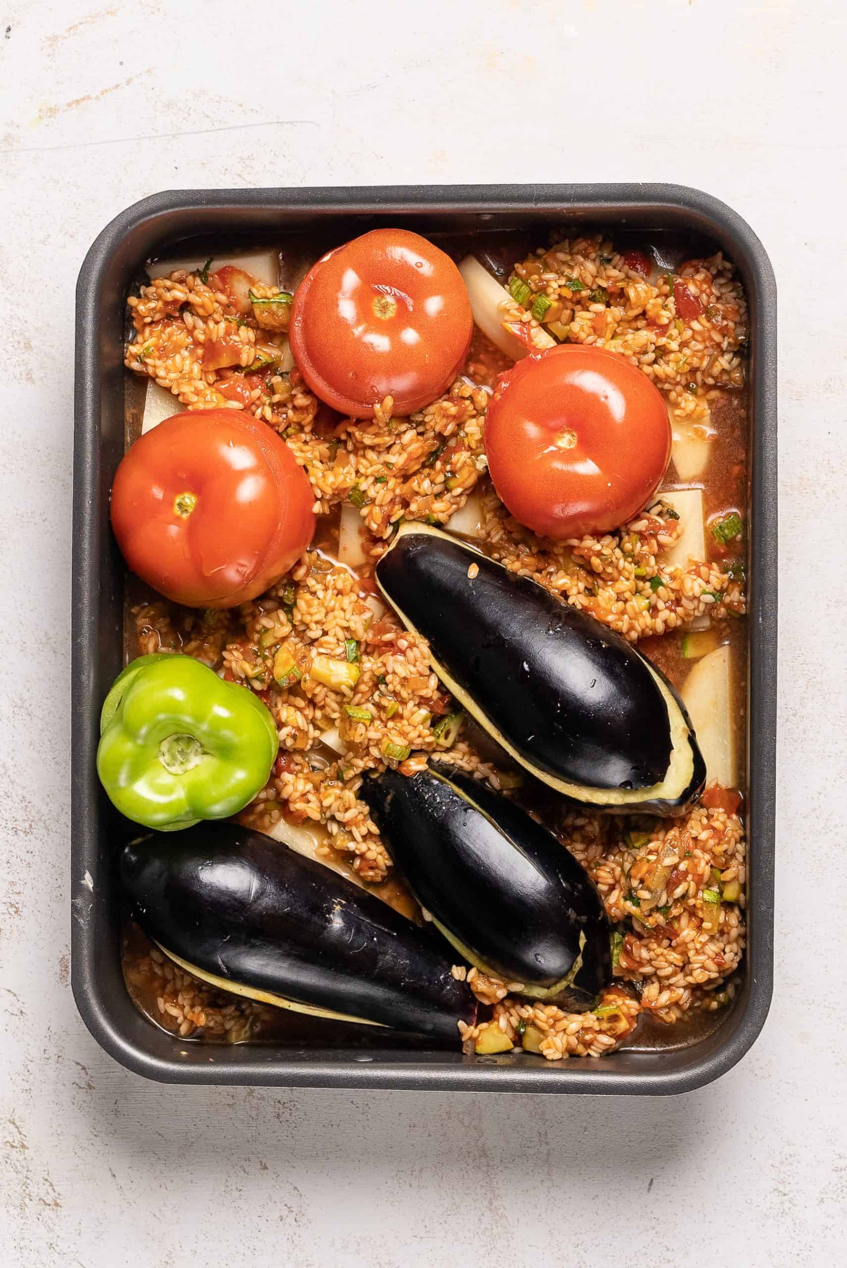 Gemista recipe (Greek Stuffed Tomatoes and Peppers with rice) - ready to bake