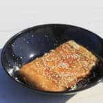 Phyllo-wrapped Feta cheese appetizer with Honey and Sesame seeds
