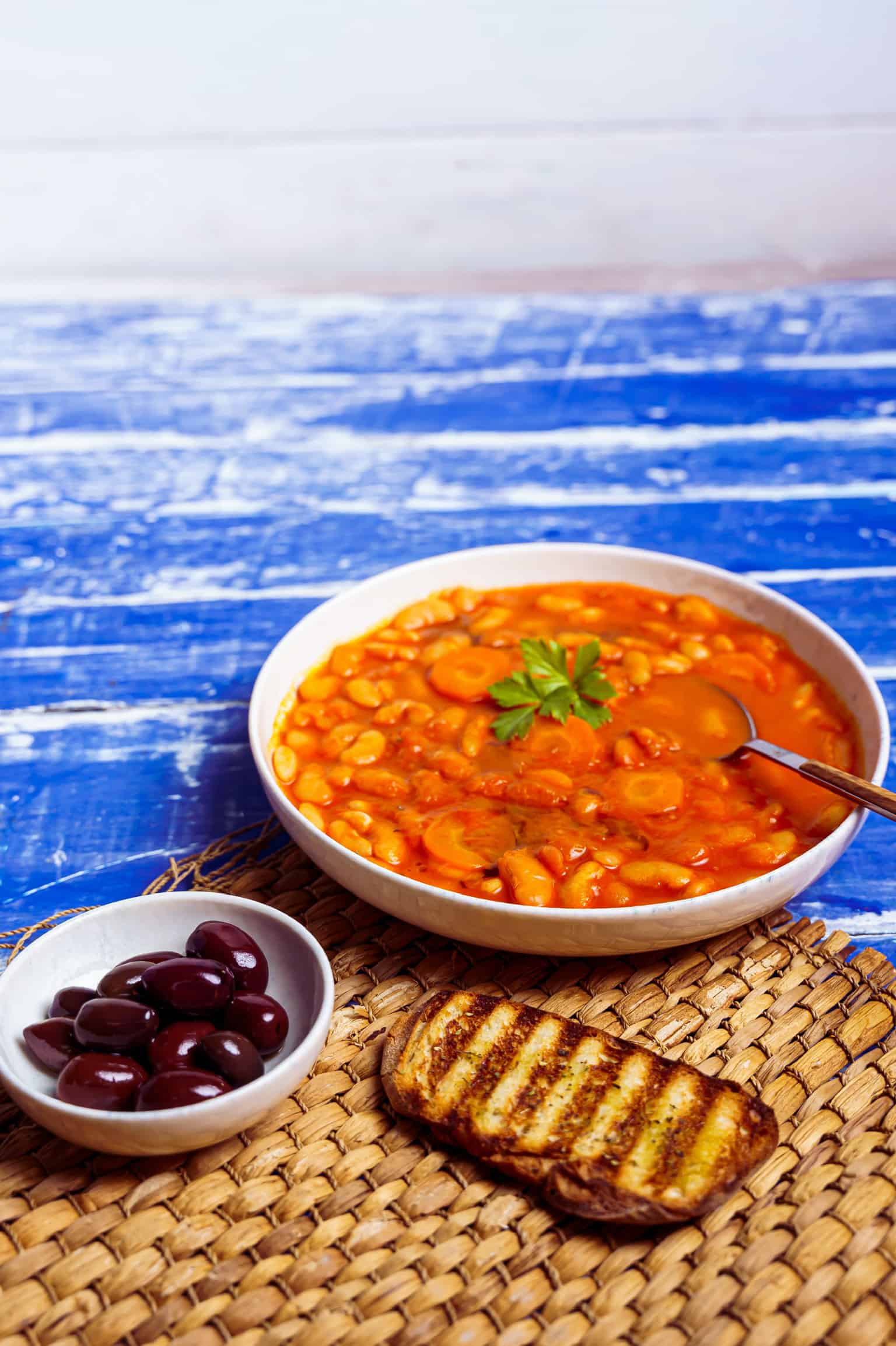 Cook Greek bean soup (Fasolada)