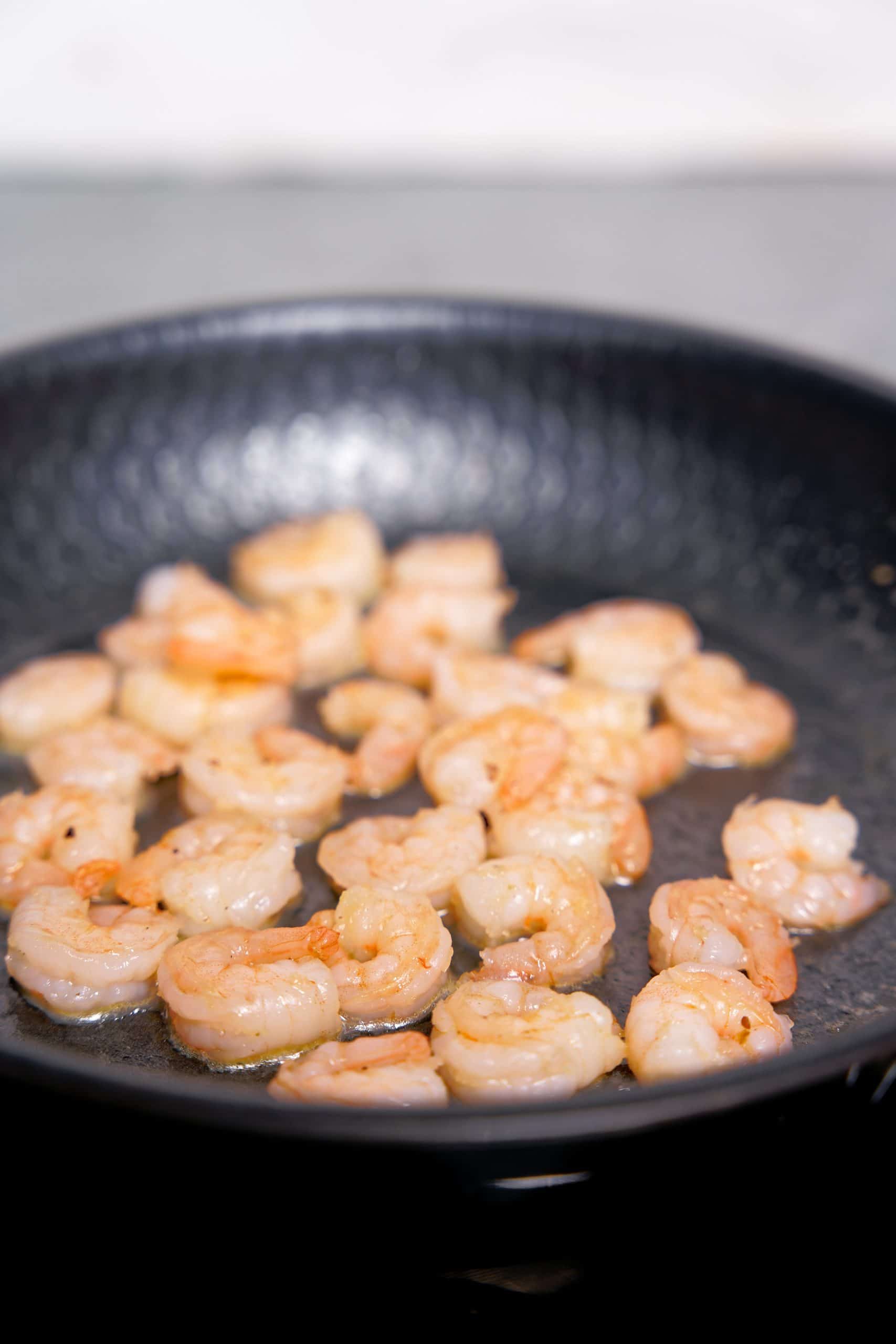 Greek Shrimp Saganaki recipe with Feta cheese (Garides Saganaki) - frying the shrimp