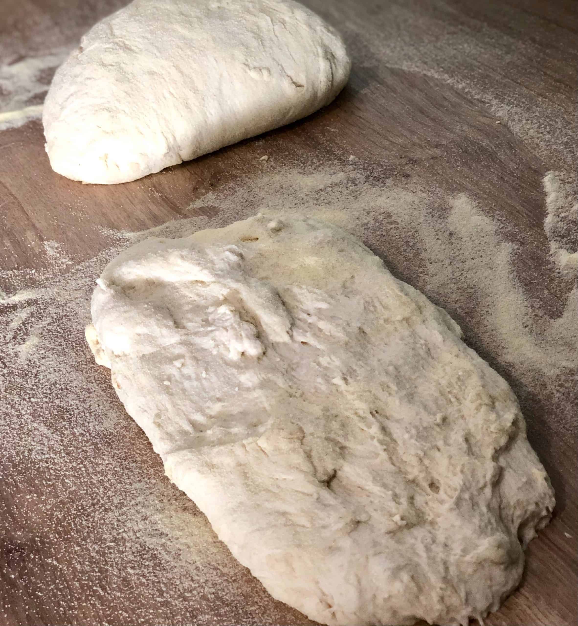 No knead bread dough cut in two pieces