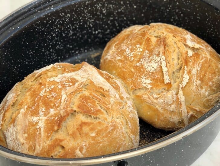 Greek Bread (Village bread/ Horiatiko Psomi) in a casserole dish 