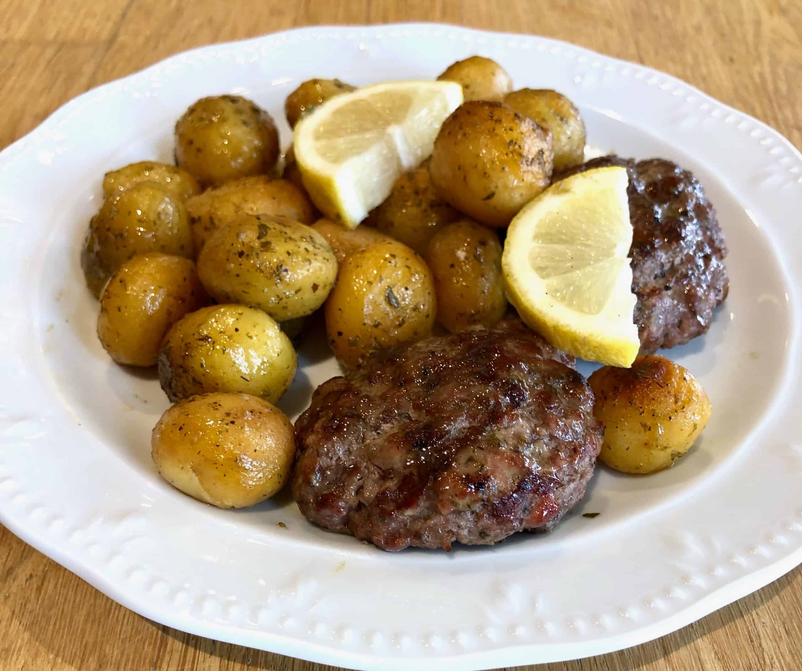 Greek Bifteki (beef patties) with potatoes