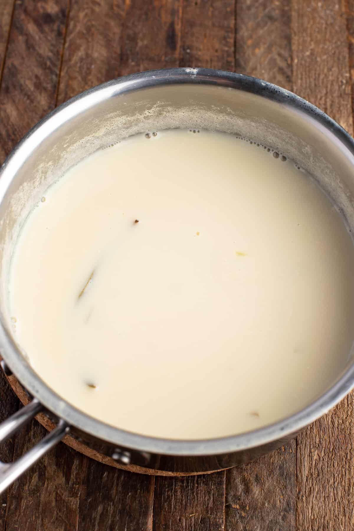Vegan moussaka with lentils preparing the milk