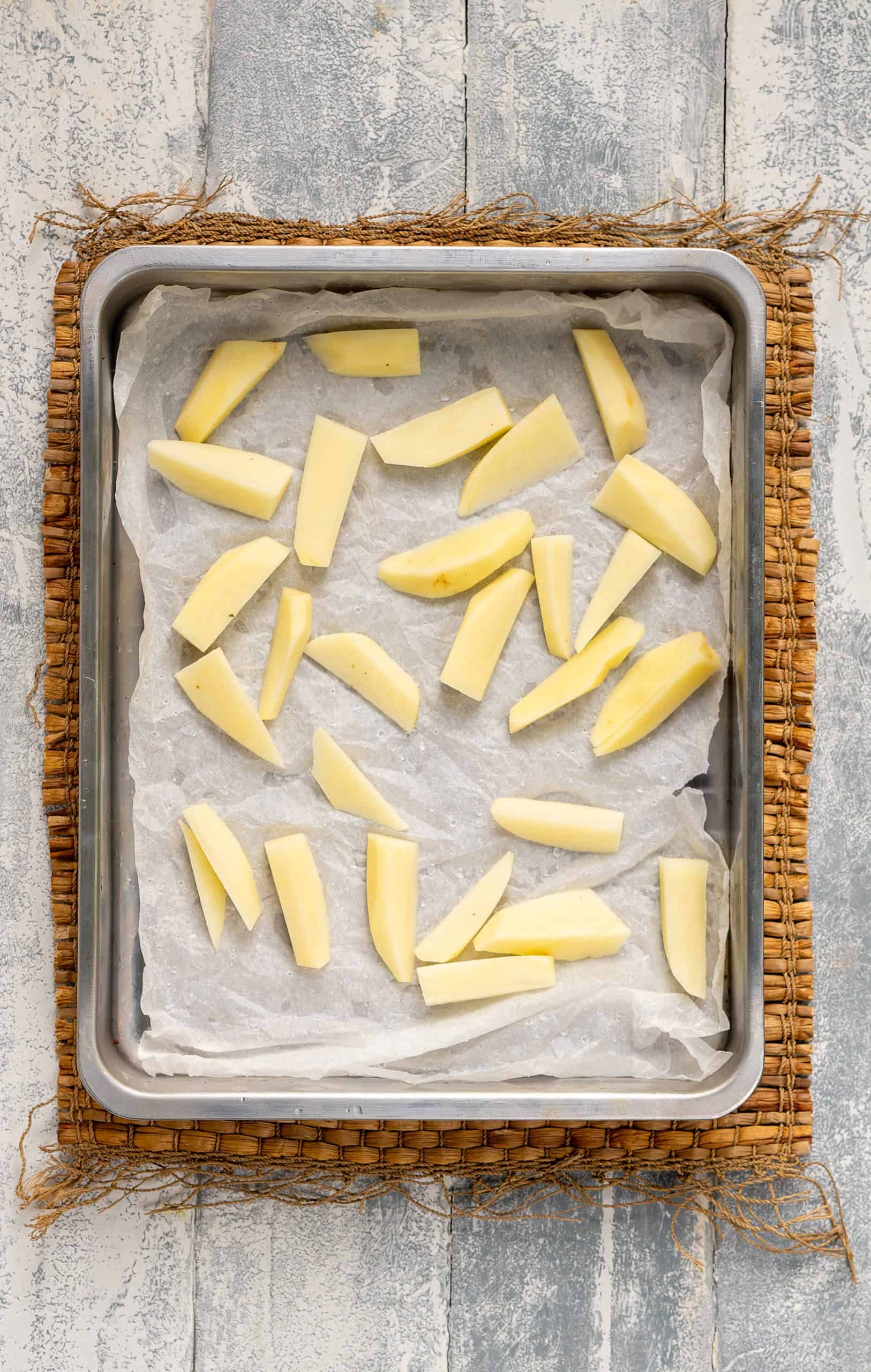 Crispiest Greek Lemon Potatoes Recipe (Patates Lemonates) cut in wedges top down
